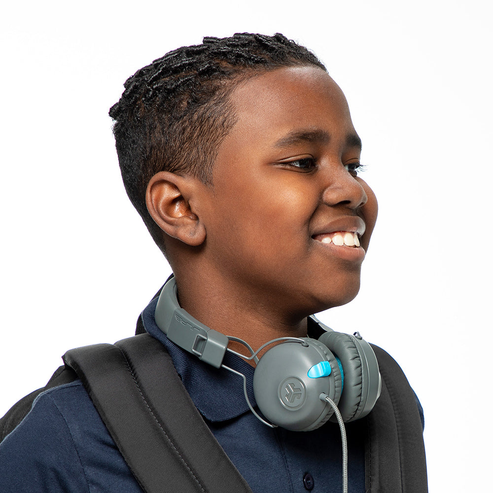 Kid with best sale headphones on