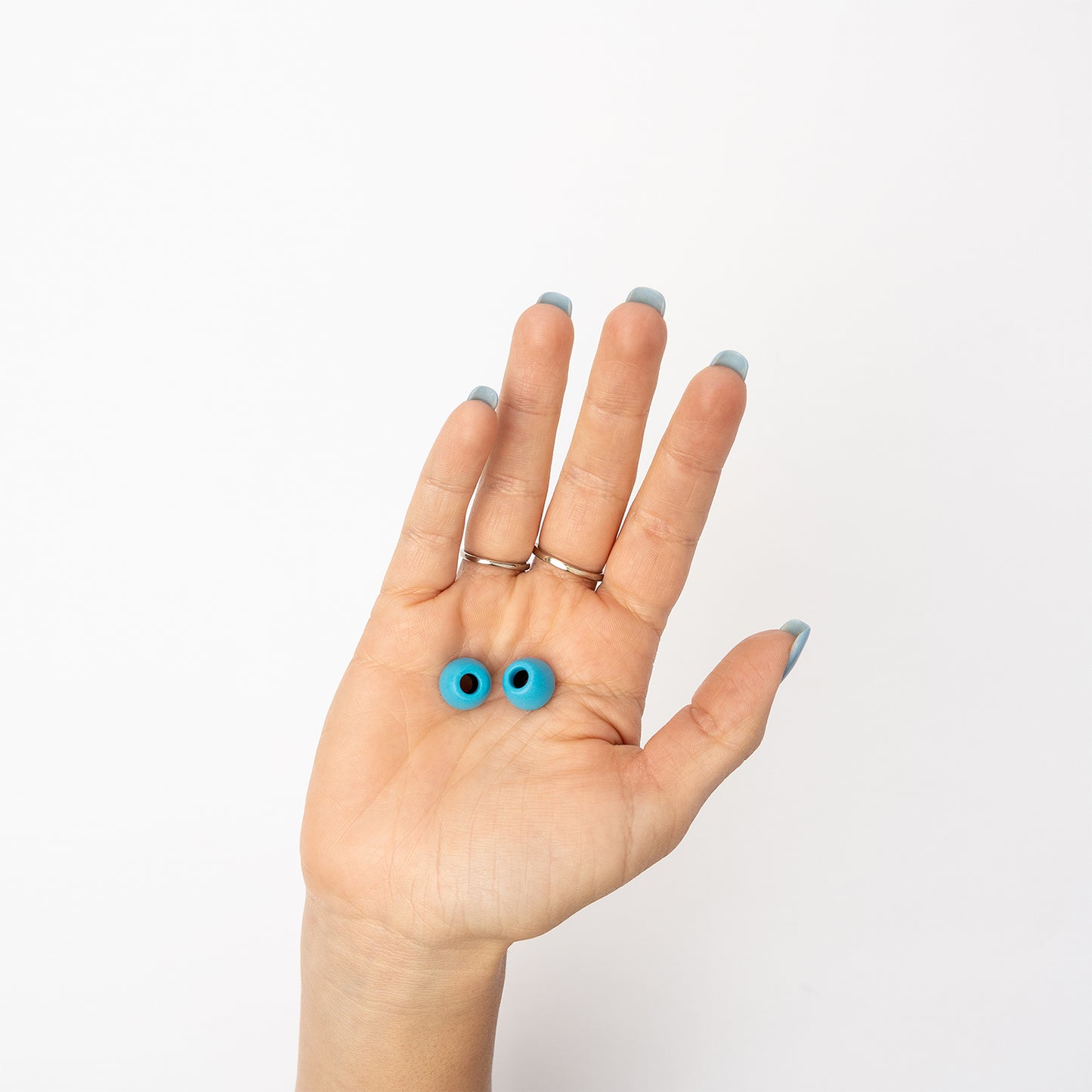 Cloud foam tips in woman's hand