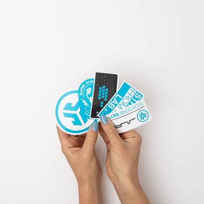 Woman holding JLab sticker pack